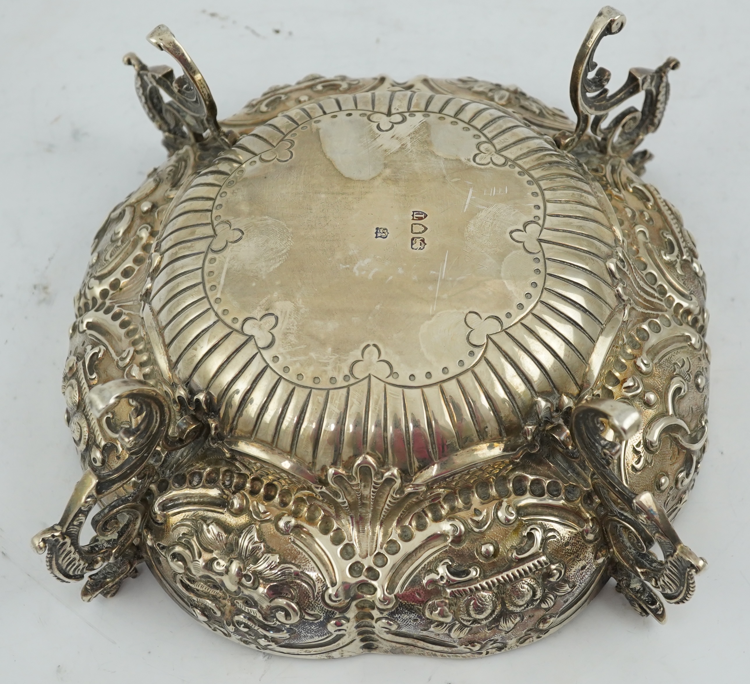 A late Victorian embossed lobed silver bowl, by Goldsmiths & Silversmiths Co Ltd?